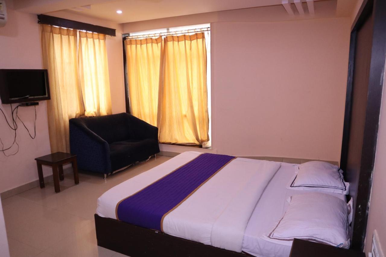 Smilestay Bns Lodge Bangalore Buitenkant foto